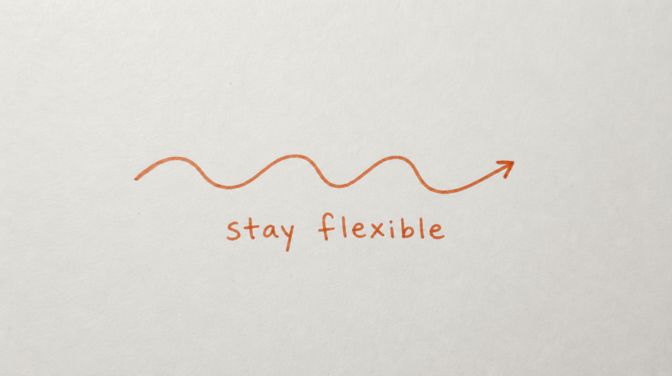 Hand-drawn wavy line diagram on paper representing staying flexible with scheduled Skool content